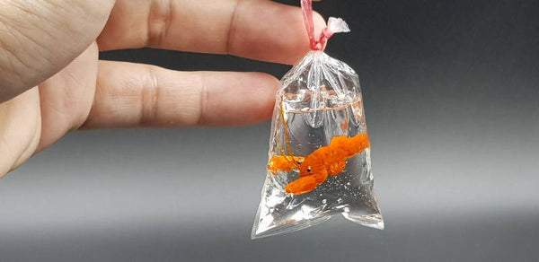 Miniature Lobster in Plastic Bag